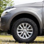 gray car with gray wheel